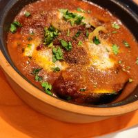 baked vegan feta and aubergine in tomato sauce - they come in spicy and normal versions at Veganissimo in Santorini