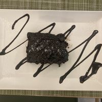 Vegan chocolate cake, really warm and freshly made 😍  at Veganissimo in Santorini