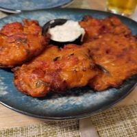 Tomato fritters and vegan tatziki at Veganissimo in Santorini