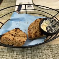 Bread with tzatziki given without having ordered and then charged for!?!?  at Veganissimo in Santorini