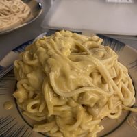 Pumpkin pasta and creamy pasta behind.  at Thong Dong Vegan Kitchen & Cafe in Lao Cai