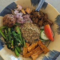Colourful rice with mushrooms, tofu, "falafel" and tasty veggies at Thong Dong Vegan Kitchen & Cafe in Lao Cai