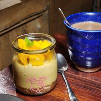 Mango cheesecake and hot chocolate at Thong Dong Vegan Kitchen & Cafe in Lao Cai
