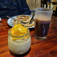 Mango cheesecake & chocolate coffee at Thong Dong Vegan Kitchen & Cafe in Lao Cai