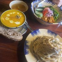 Pumpkin soup, colorful rice, noodles with mushrooms   at Thong Dong Vegan Kitchen & Cafe in Lao Cai