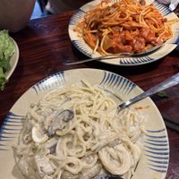 Creamy spaghetti and tomato spaghetti   at Thong Dong Vegan Kitchen & Cafe in Lao Cai