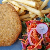 Schnitzel. Nice chips and salad. at Waterfront Hotel in Beauty Point