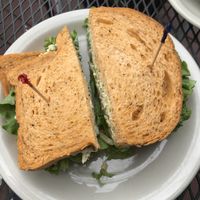 Mock chicken salad on tomato bread with lettuce and pickles! at Wild Oats Bakery and Cafe in Brunswick