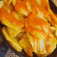 Spicy potatoes 🫶 at La Vida Bonita Beach Club in Santa Pola