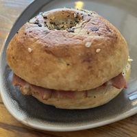 Eggless & bacon bagel  at Next Door Baker by Kegarmo in South West London