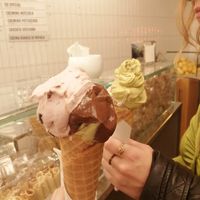 Sour cherry, chocolate and pistachio at the front and pistachio (€4) and almond at the back (€3). at Cremeria Cavour in Bologna