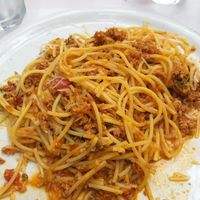 Spaghetti bolognaise with soy minced meat and vegan cheese at Blue Grotto in Paxos