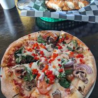 Veggie pizza with red sauce and vegan cheese at Mattenga's - Sea World in San Antonio