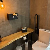 The women's bathroom was super clean and well stocked with lots of pads and tampons! at Pizzeria Km0 in Valencia