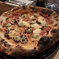 Pizza chulilla at Pizzeria Km0 in Valencia
