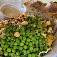 Close up of Thai Peanut salad w bread   at Sage Fresh Eats in Durango