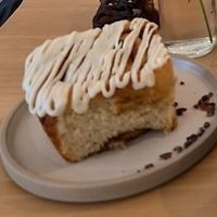 Vegan cinnamon bun with classic frosting at Caleta Dolsa Coffee in Lima