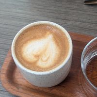 Coffee served with water at Caleta Dolsa Coffee in Lima