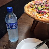 Pure water/ pizza at Chido's in Ometepe