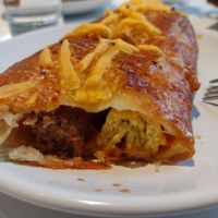 Inside of a Sausage, Egg, and Cheese Roll at Flour + Time Bakery in Atlanta