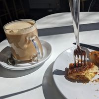 Chai Tea Latte and Bakon, Egg, and Cheese Croissant.  at Flour + Time Bakery in Atlanta