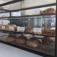 Display case of pastries and other bakery items. at Flour + Time Bakery in Atlanta