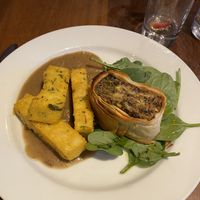 Mushroom, goats cheese, and Heather ale strudel with polenta chips at David Bann Restaurant in Edinburgh