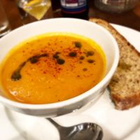 Red pepper, sweet potato and tomato soup with homemade bread at David Bann Restaurant in Edinburgh