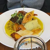 Haggis, neeps and tatties with puff pastry - Puy lentil haggis and turnip with homemade puff pastry. Served with potato mash and Scotch whisky sauce. [vg]  at David Bann Restaurant in Edinburgh