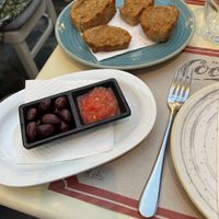 Garlic bread (made with oil) and tomato dip with kalamata olives  at Agrimia Restaurant in Crete