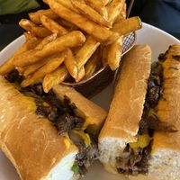Loaded Cheesesteak with Seasoned Friess  at Vegan Vibes Cafe & Juice Bar in Philadelphia