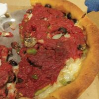 Our half eaten veggie deep dish at Gino's East - South Loop in Chicago