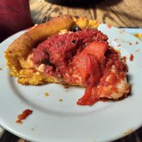 I chose fresh garlic, roasted peppers and olives as my toppings. Very tasty! at Gino's East - South Loop in Chicago