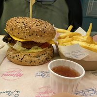 Chicken burger and Cajun fries. We chose a ginger chili sauce for fries (large sauce selection to choose from!)    at The Sunny Burger Co. in Amsterdam