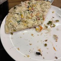 The vegan pizza - dry with no marinara   at The 60's Cafe  in Rishikesh