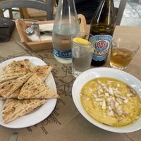 Pita bread with traditional hummus-like dip   at Mpakalógatos in Naxos