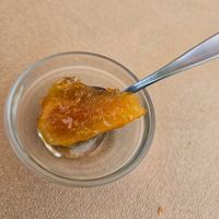 Fun little dessert. Orange slice with syrup. at Mpakalógatos in Naxos