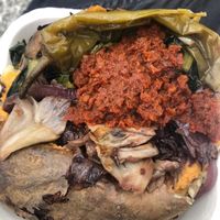 Jacked potato with dried tomatoes and vegetables   at Poormanger in Milan