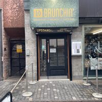 Brunchin is a doorway between 2other restaurants   at Brunchin’ in Liverpool