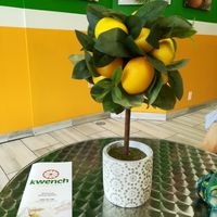 Tables inside at Kwench Juice Brockton in Brockton