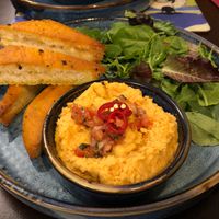 Our own red pepper hummus, dressed salad and homemade garlic and chilli
flatbread. at Edinbane Inn in Isle Of Skye