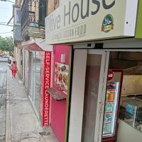 One small step in a side street from the main promenade in Sliema's southeastern shoreside, small entrance at Olive House - Maybe closed in Sliema