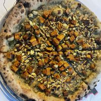 Vegan curry cashew pizza  at Salt Point Brewing Co in Lansing