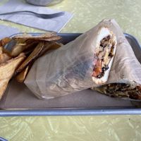Philly cheesesteak with homemade russet potato chips  at The Green Beautiful  in Manchester
