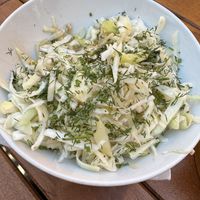 Cabbage salad garnished with dill  at Snow Restaurant in Sinaia