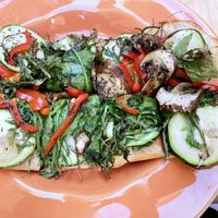 Pizza Veggie - totally vegan with zucchini slices, onion, roasted pepper, fresh spinach, mushrooms and tomato slices #Veganuary at Madness Specialty Coffee in Alicante