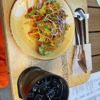 Tostadas and peach iced teaa  at Madness Specialty Coffee in Alicante