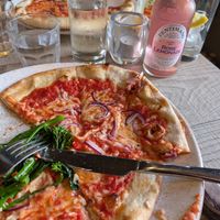 Pizza with a side of chilli and garlic tenderstem broccoli at Ego at The Grapes in Shrewsbury
