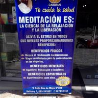 Meditation sign outside the restaurant. at Darshan Vegetarian Restaurant in Iquitos