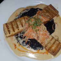 grilled tofu with thai curry, black rice & papaya/carrot shreds at Beach House in Koloa